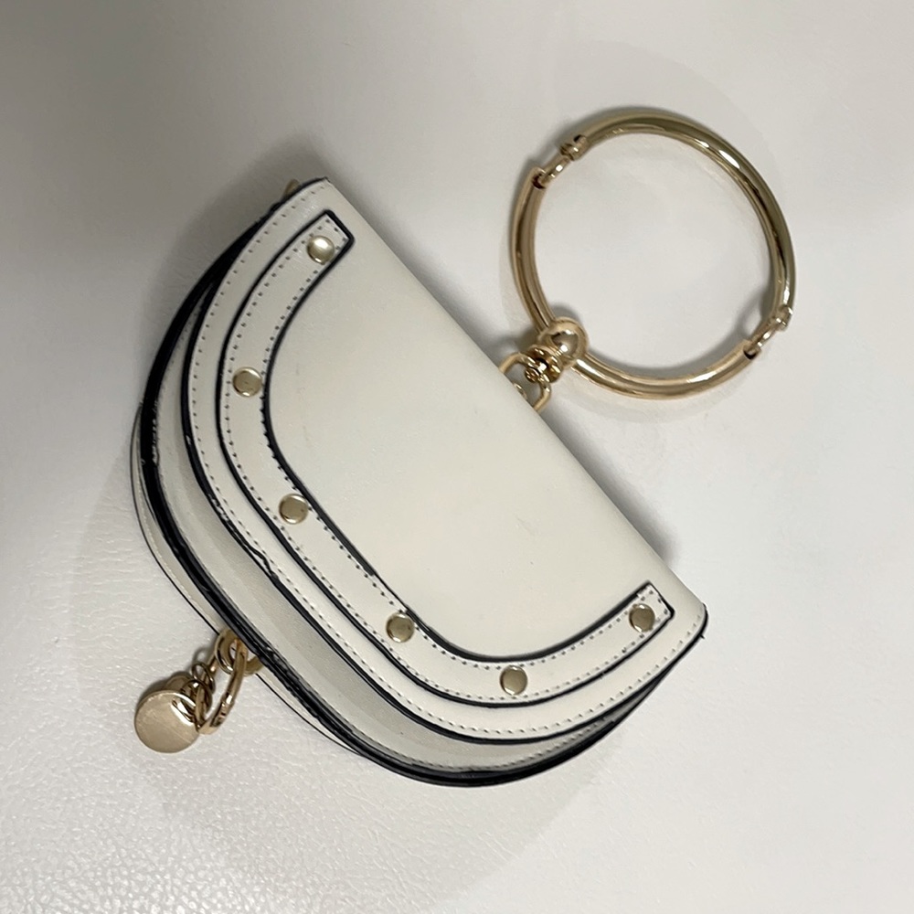IVORY WRISTLET/CLUTCH WITH GOLD ACCENTS